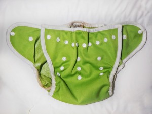 Thirsties cloth diaper cover green on changing table