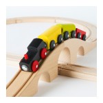IKEA Lillabo wooden train starter set with black engine pulling three cars over a hill in a figure eight set up of wooden tracks