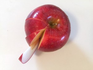 Sliced apple with one slice sticking out