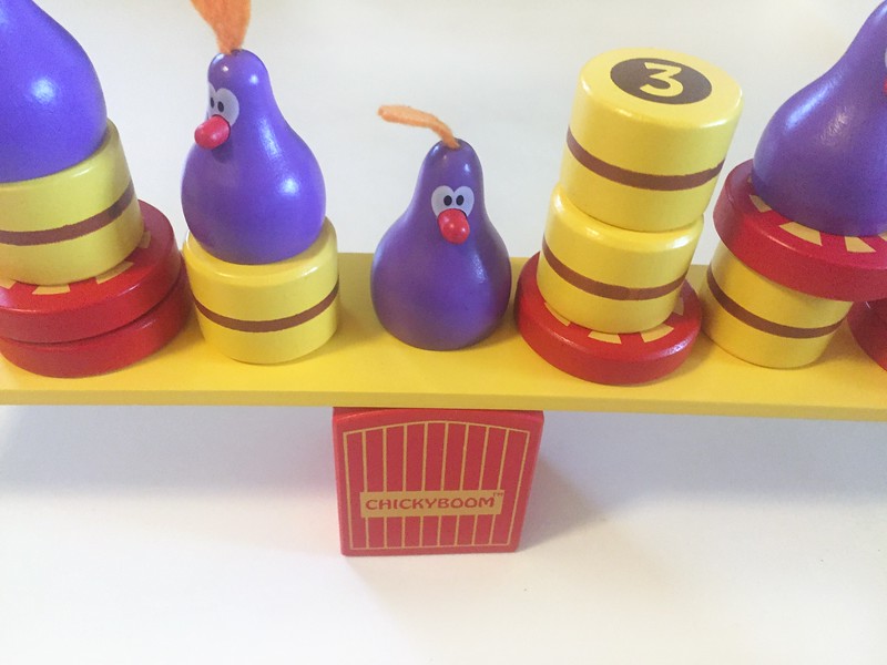 Chicky Boom chicken balancing game young kids purple chickens