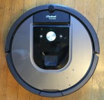 irobot roomba vacuum in silver and black