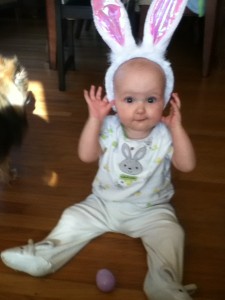 Baby in bunny ears and Easter outfit
