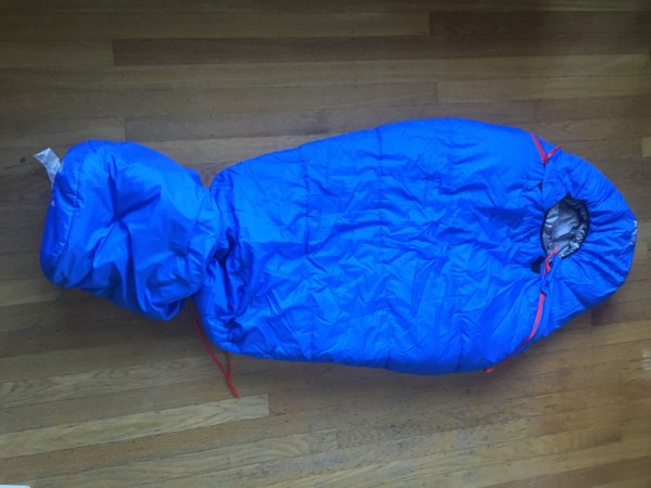 Stuff sack adjustment on REI Nodder kids sleeping bag in blue