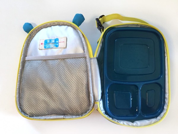 Skip Hop Lunch bag in blue and yellow hippo shown open