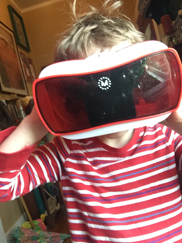Kids looking in a View-Master virtual reality viewer