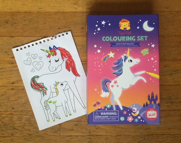 Unicorn magic colouring set Tiger Tribe box and page torn from notebook and partly covered