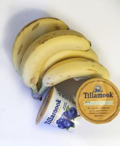 Bananas bunch with Tillamook individual yogurt containers cups