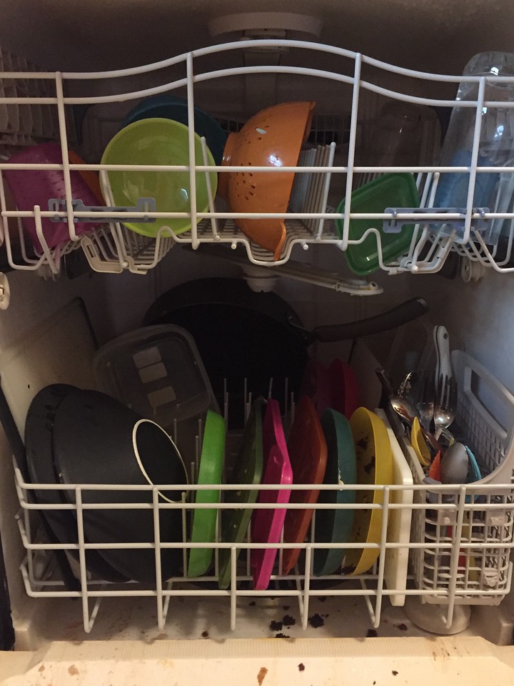 Dishwasher full of dirty kid dishes