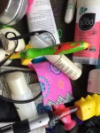 Travel size bathroom stuff in a pile