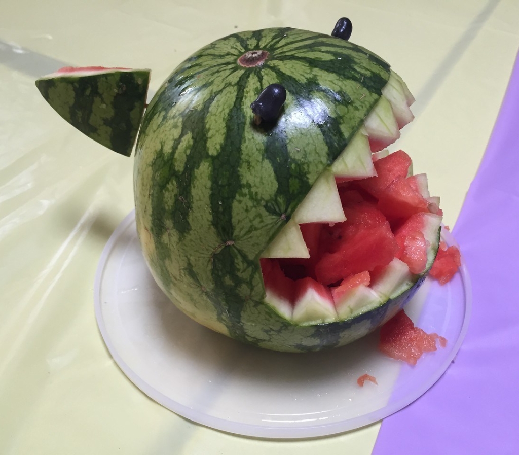 Watermelon shark from round watermelon at child's birthday pool party