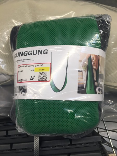 IKEA Gunggung kids swing in green with black webbing inside packaging