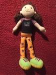 Manhattan Toys Groovy girls with orange legs and green shoes in Girls Rock! t shirt