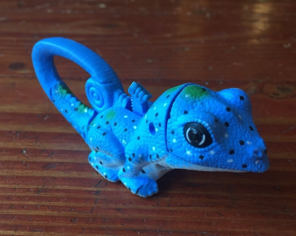 Blue lizard kids' animal flashlight with tail handle and light hidden inside mouth