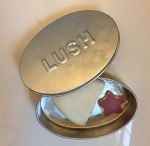 LUSH Tender Is the Night solid massage bar in signature silver tin