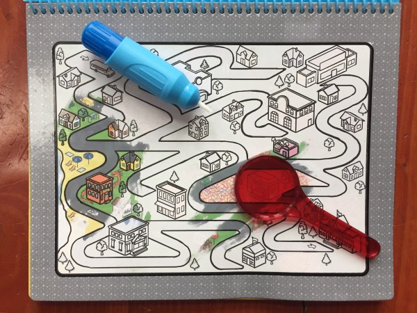 Melissa and Doug Water Wow Deluxe Around the Town with red lens and water pen on page