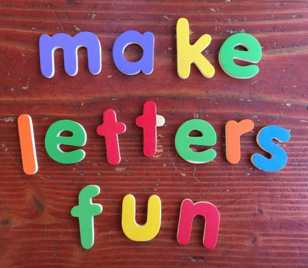 Melissa & Doug See and Spell wooden colorful lowercase letters used to spell make letters fun on