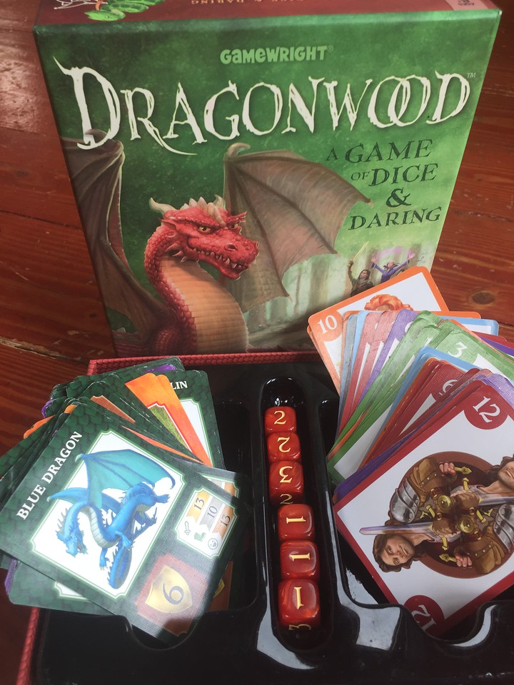 Dragonwood kids card dice game in box with cards and dice from Gamewright