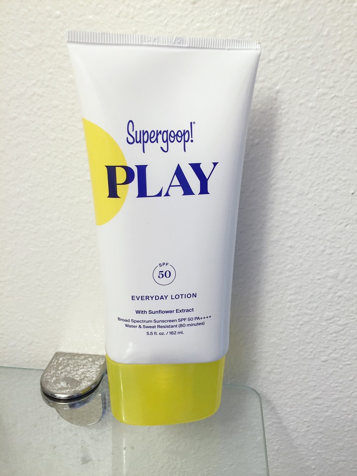 Supergoop! Everyday Play 50 SPF face moisturizer sunscreen lotion sun protection white bottle blue letters yellow cap