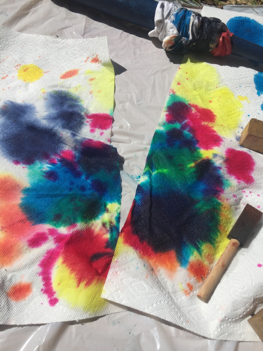 Tie-dye paper towels after dying shirts with Tulip Party Kit in a box