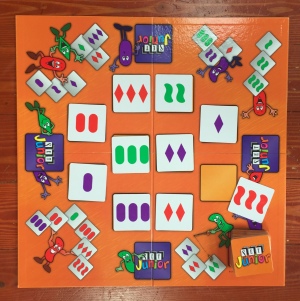 Set Junior board with tiles in empty spaces ready to play card game for kids