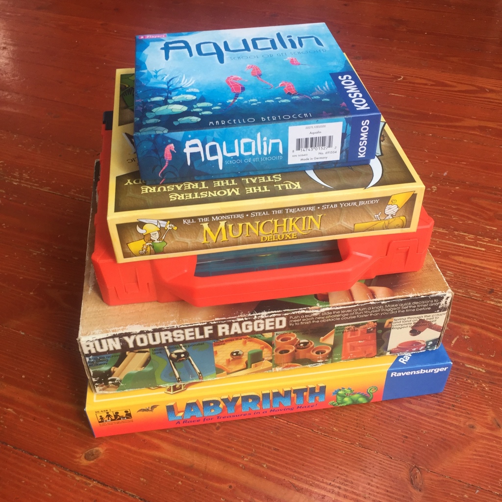Aqualin Munchkin Battleship Shots Run Yourself Ragged Labyrinth board games for school aged kids in a stack