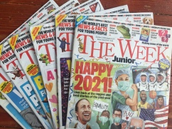 The Week Junior magazine for kids multiple issues from 2021 fanned out on floor