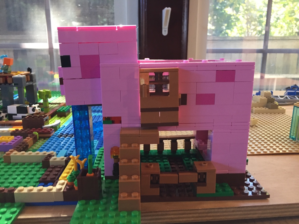 Minecraft Pig House Lego set constructed and sitting on table