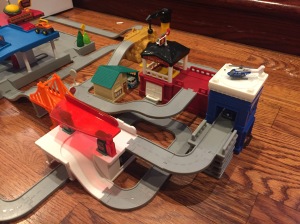 Driven Pocket Series Build-A-City Play Set with fire station gas station police station construction site and more