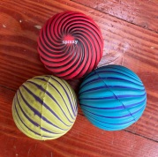 Waboba Spizzy Balls in red, blue, and yellow