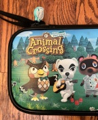 Animal Crossing Nintendo Switch case cover with Blathers the owl and K.K. Slider singer dog and Tom