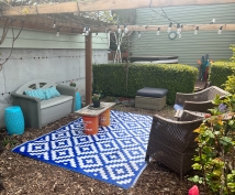 FH Home outdoor rug in backyard seating area