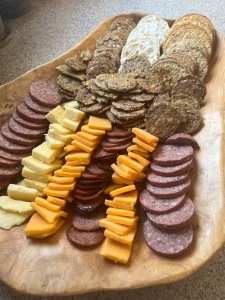 snack plate cheese and crackers and salami