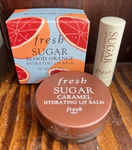 Fresh Sugar lip balm in Advanced Therapy tube, caramel pot, blood orange pot in box
